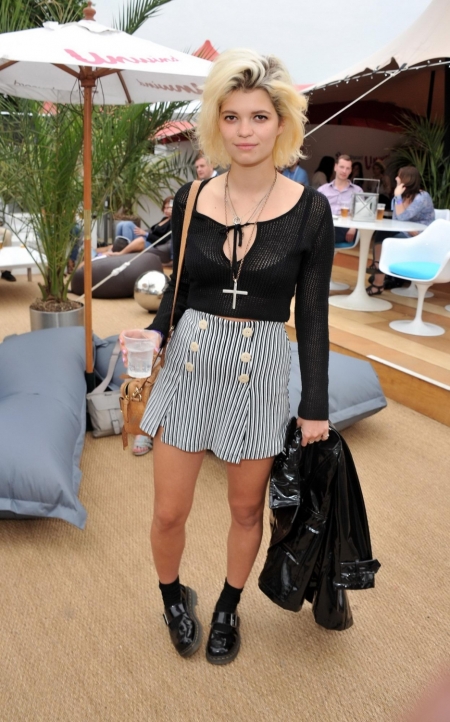 Pixie-Geldof-Best-Looks-StyleChi-High-Waist-Striped-Nautical-Skirt-Black-Knitted-Top-Cross-Necklace-Patent-Trench-Coat-Chunky-Shoes-Blonde