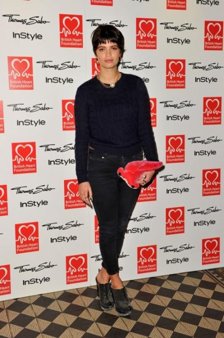 Pixie-Geldof-Best-Looks-StyleChi-Tunnel-Of-Love-Navy-Cable-Knit-Sweater-Black-Ankle-Grazer-Jeans-Stuffed-Animal-Clutch-Studded-Heeled-Clogs-Gold-Chain-Necklace-Brunette